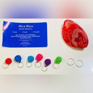 NWT 6 Yarn Shaped Stitch Markers with Dumpling Storage Case!